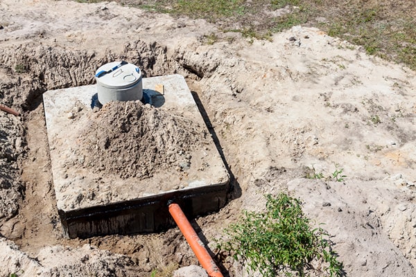 septic tank pumping involves removing accumulated solids and liquids from the septic tank to prevent build-up and potential system failure